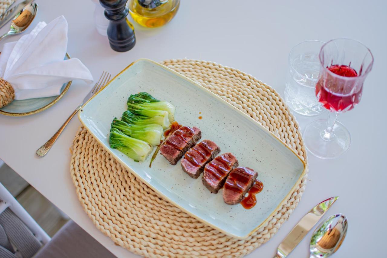 Malahini Kuda Bandos Resort Hulhumale Ngoại thất bức ảnh A placemat